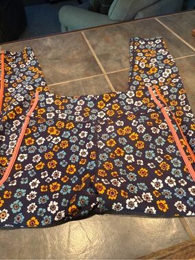 The Upside Floral Navy Leggings with Yellow & Teal Flowers and Coral Zippers
